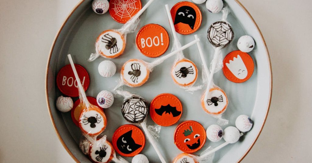 A vibrant assortment of Halloween-themed candies in a bowl, perfect for seasonal celebrations.